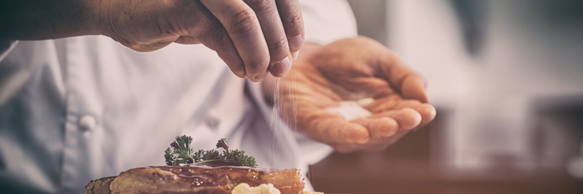 Chef preparing food using quality local produce